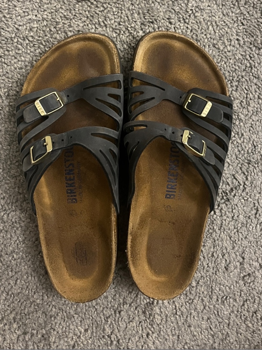 Birkenstock Black Strappy Slide Sandals with Gold Buckles
